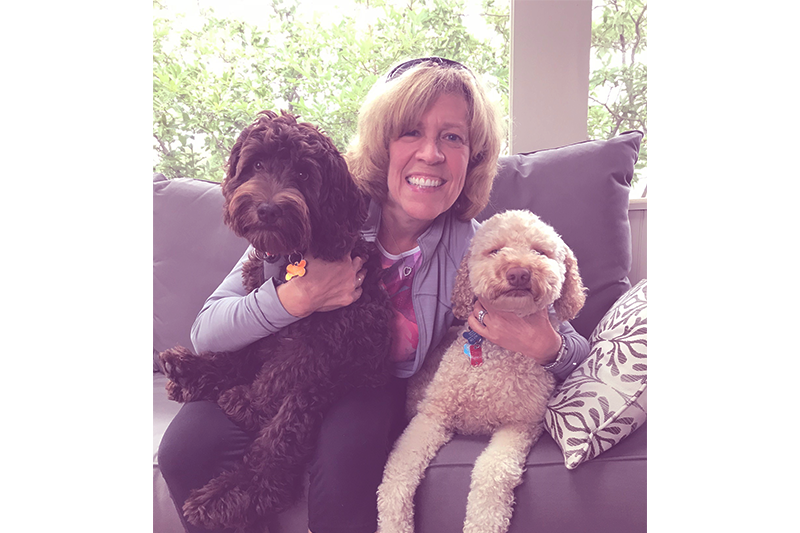 attorney Andi Drucker breast cancer survivor with her dogs