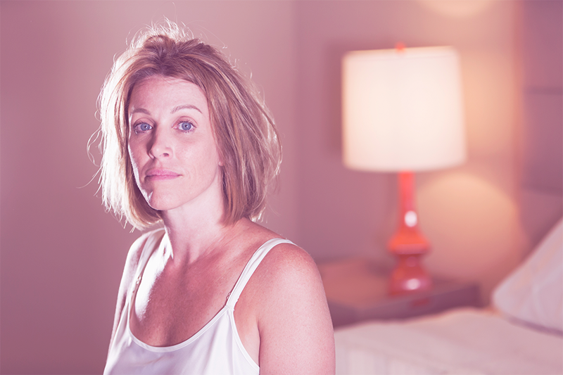 woman over 40 can't sleep because of hot flashes