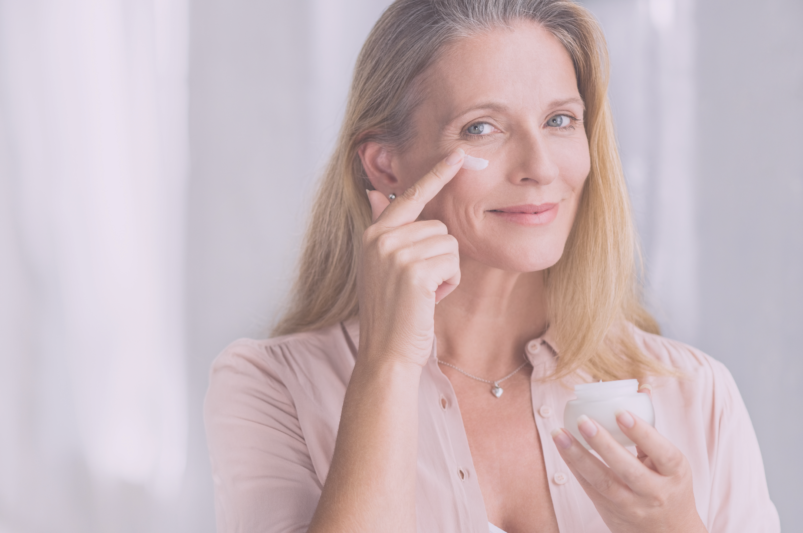 woman over 50 caring for aging skin