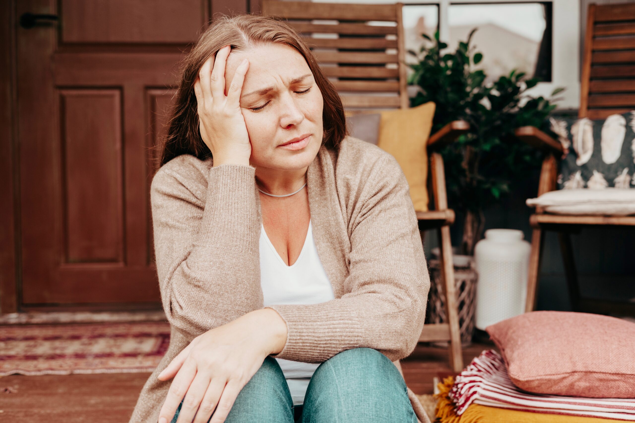 Woman experiencing menopause symptoms Woman experiencing menopause symptoms