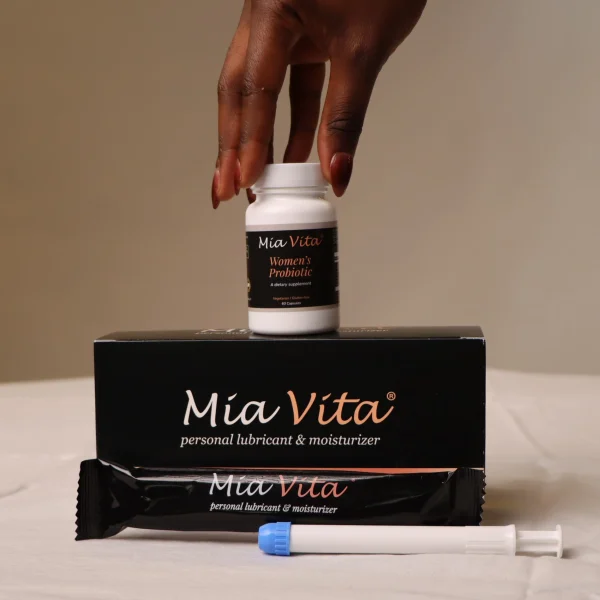 Mia Vita Women's Probiotic on top of a box of Mia Vita Personal Lubricant & Moisturizer