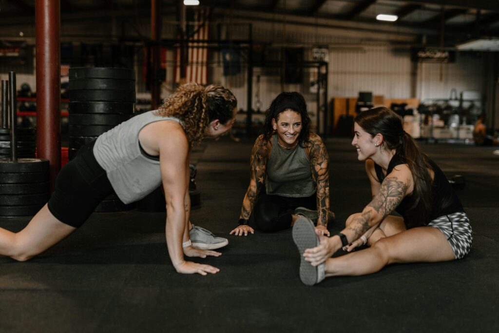 group of women stretching at gym