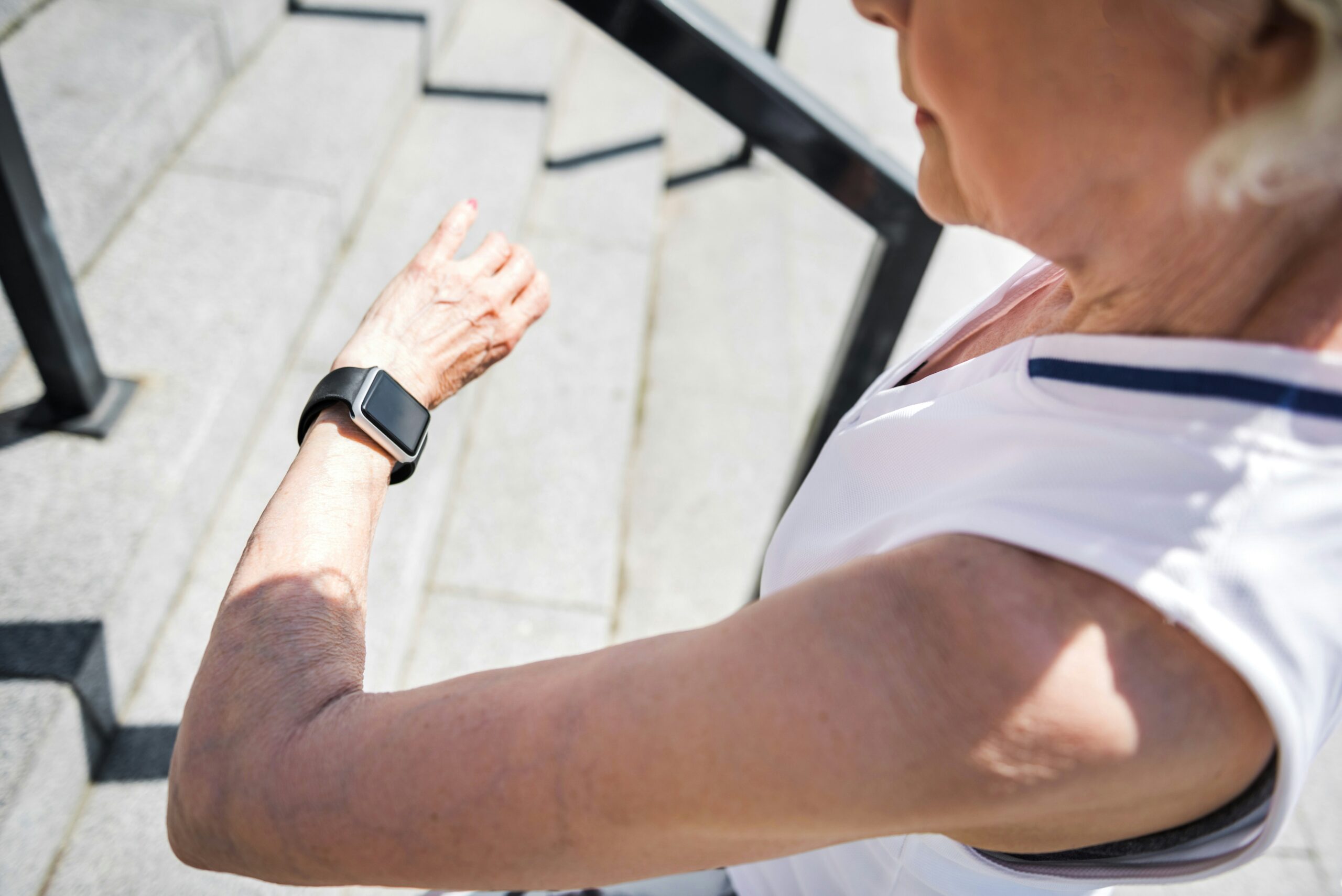 mature woman looking at watch