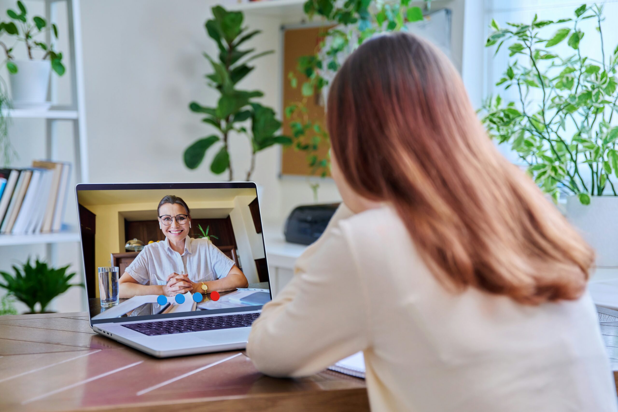 woman talking to someone on computer